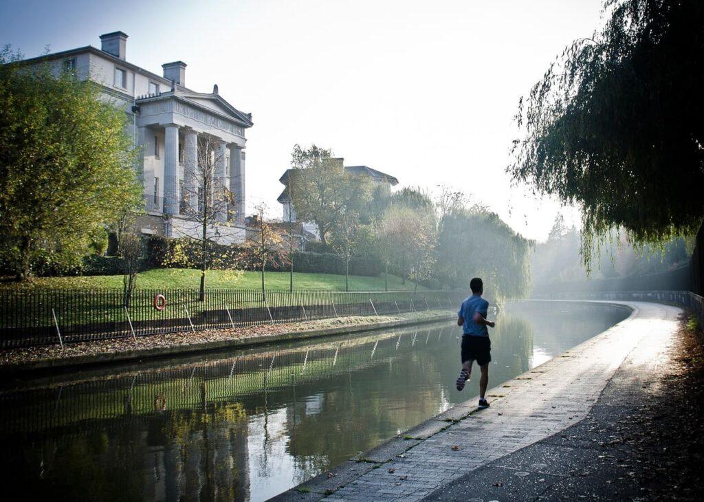 Motivated person running in the park.