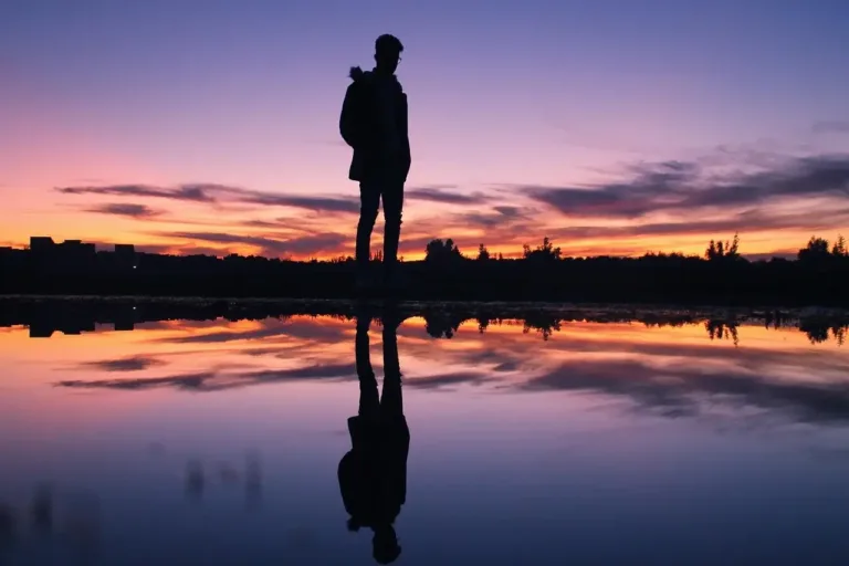 Silhouette with a reflection, representing having self-awareness.