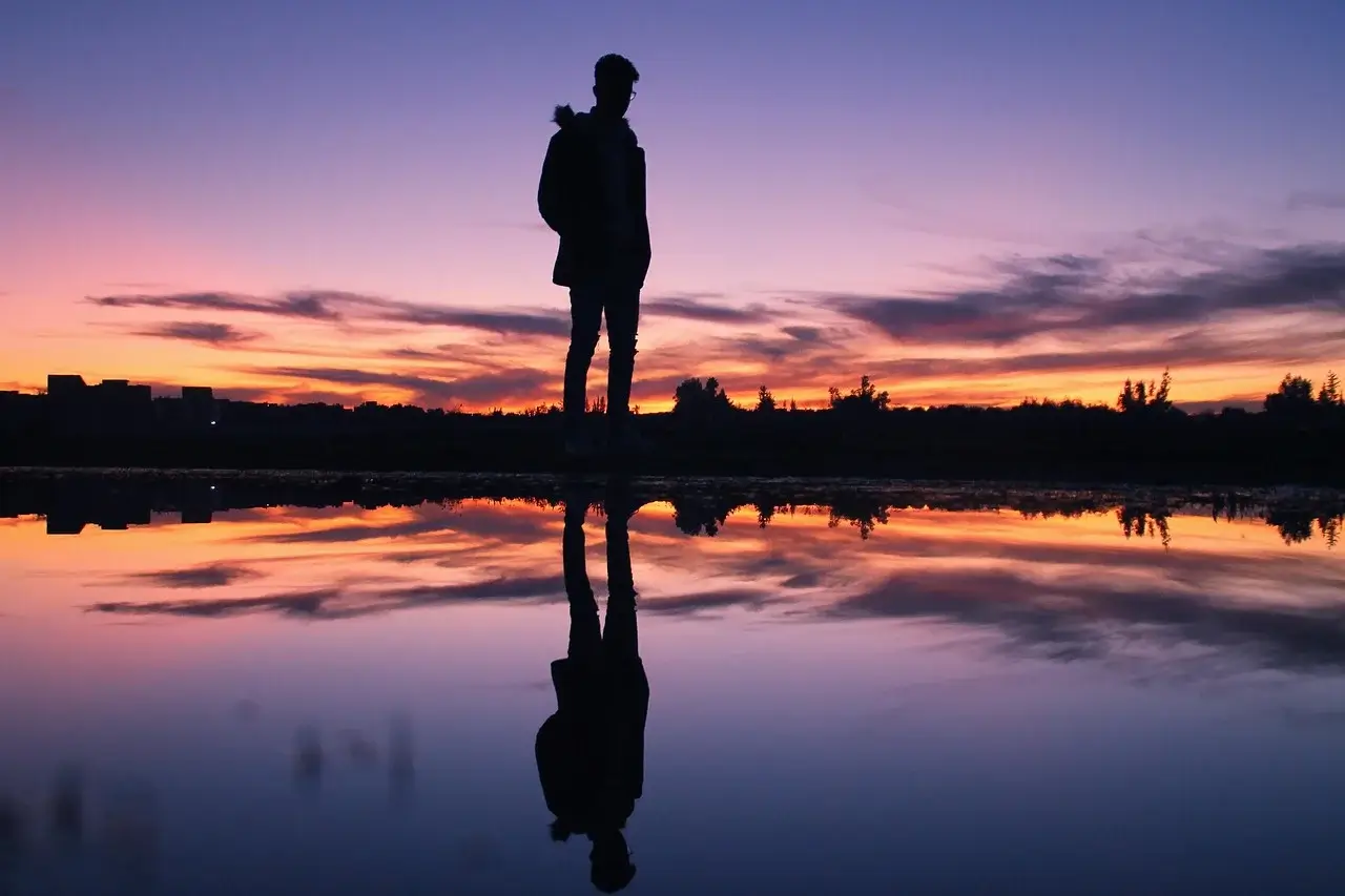 Silhouette with a reflection, representing having self-awareness.
