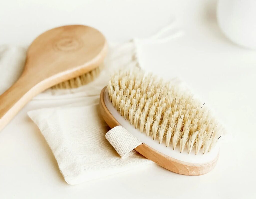 Dry body brush, a wellness and beauty essential product.