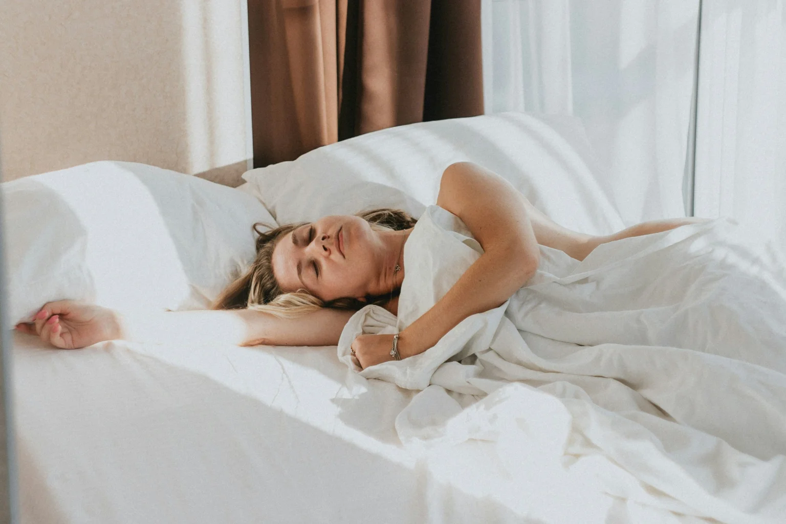 Woman having good sleep after her night routine.