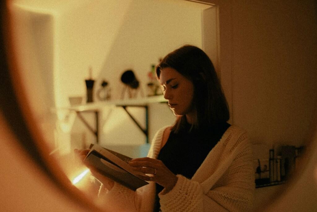 Woman reading her positive daily affirmations.