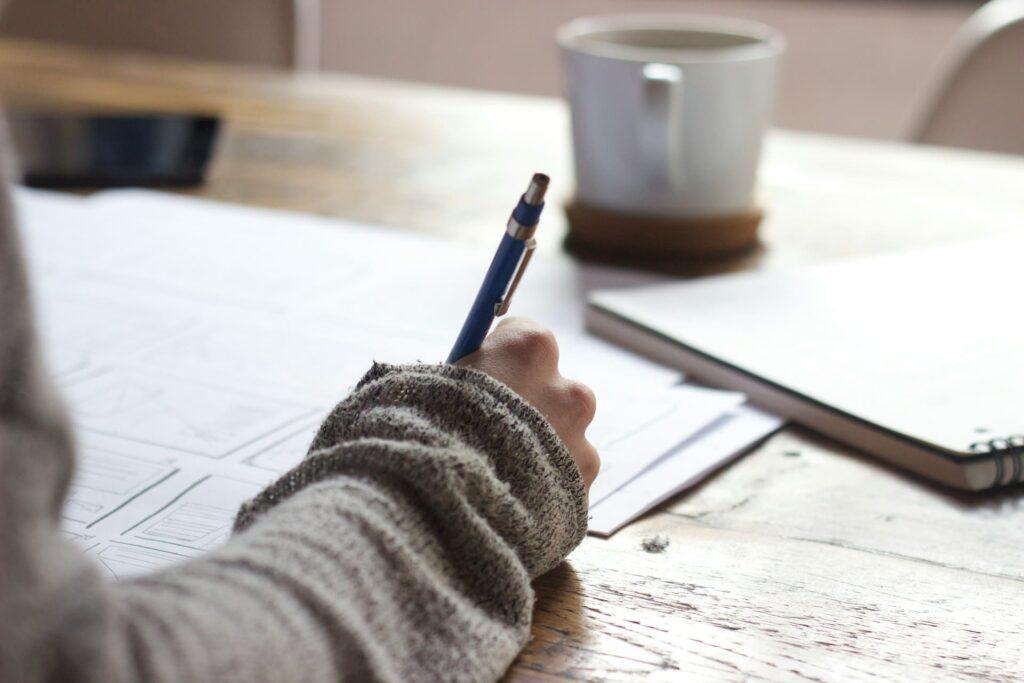 Woman journaling for self-growth.