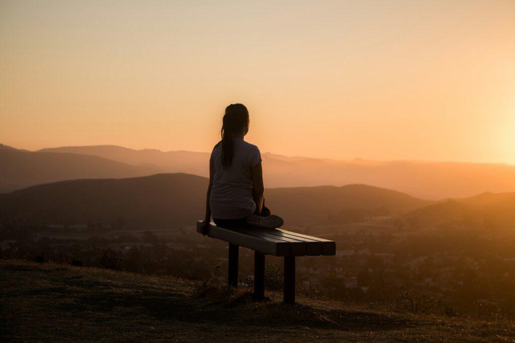 Woman accepting things she cannot control as a way to be happier in life.