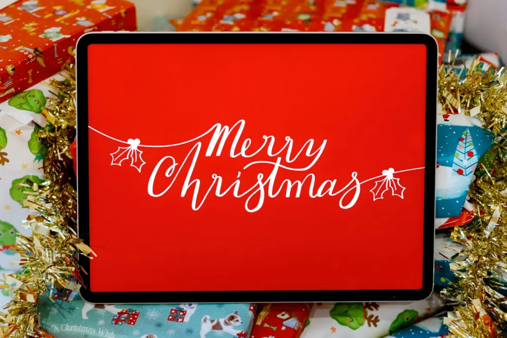 Apple iPad with a sign Merry Christmas, as one of the best Christmas gifts for women that's frequently on Christmas wish lists.