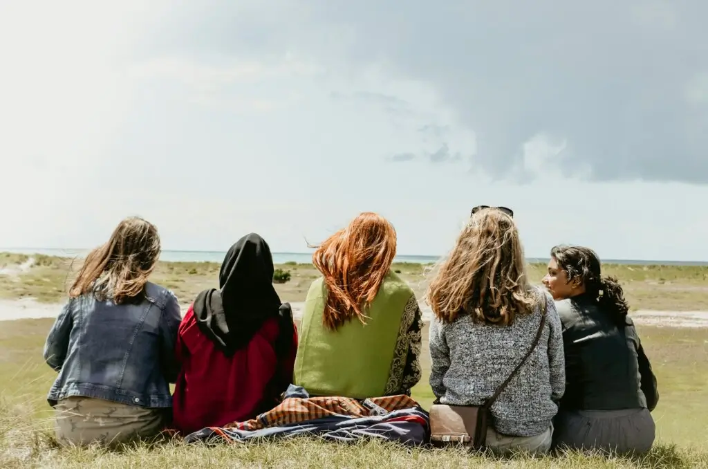 Group of women sitting together.