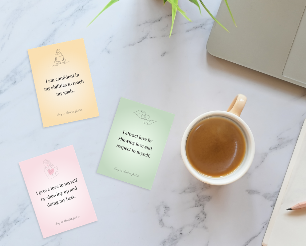 Self-love affirmations on a desk.